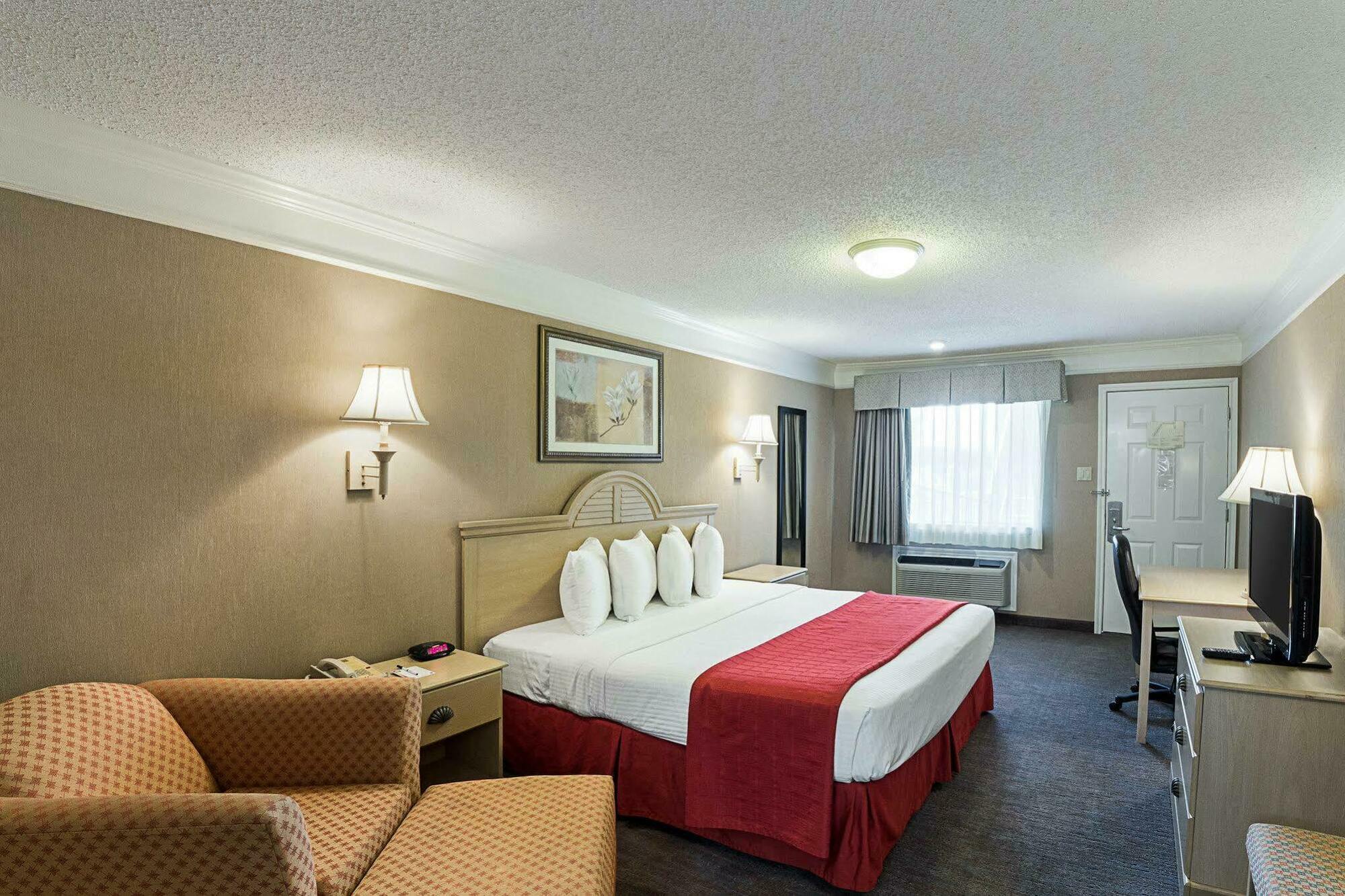 Quality Inn Near Lake Марбл-Фолс Экстерьер фото